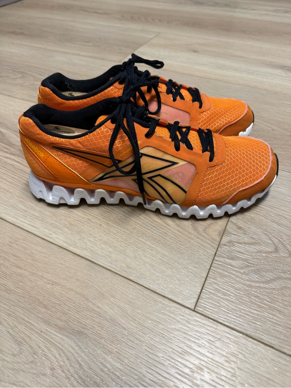 Reebok 3D FuseFrame running shoes in orange with black accents Men’s Size 10